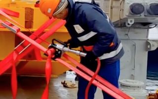 Cordstrap Experts Securing Steel Frame Olympic Stadium on Vessel