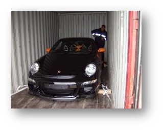 Black porsche secured in container with cordstrap composite lashing