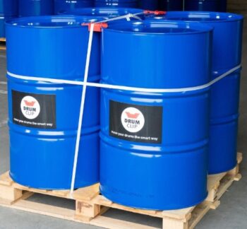 Drumclip and cordstrap composite strapping to strap steel drums onto pallet