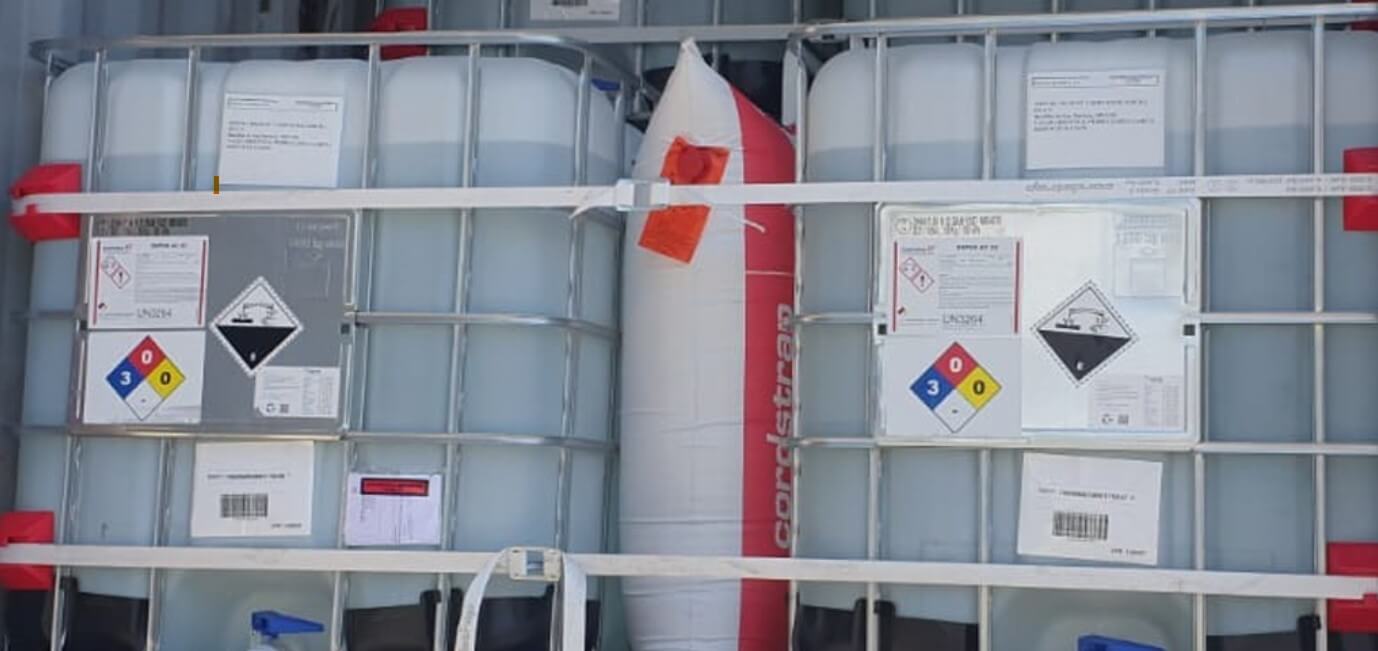 Cordstrap dunnage bag, lashing and IBC protectors in shipping container safely securing IBC's